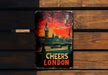 a sign on a wooden wall that says cheers london