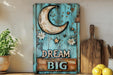 a blue door with a moon and stars painted on it