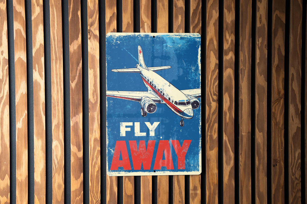 a sign on a wooden wall that says fly away
