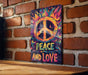 a peace and love sign on a brick wall