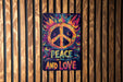 a peace and love sign on a wooden wall