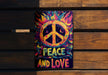a peace and love sign on a wooden bench