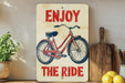 a sign that says enjoy the ride on it