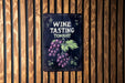 a wine tasting sign hanging on a wooden wall