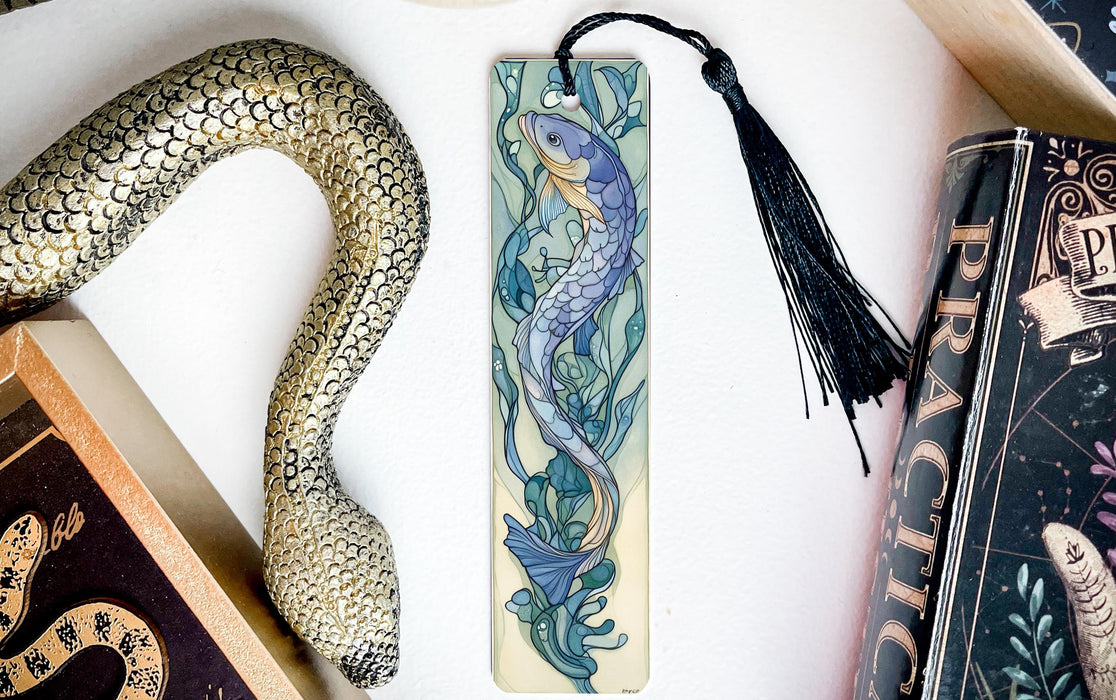 a bookmark with a snake and a snake on it