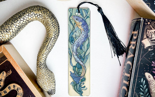 a bookmark with a snake and a snake on it