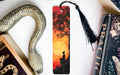 a bookmark with a picture of a man on a tree