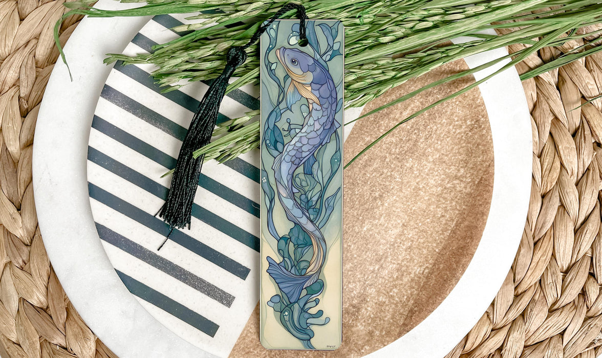 a bookmark with a picture of a mermaid on it