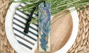 a bookmark with a picture of a mermaid on it