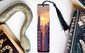 a bookmark with a picture of a city at sunset