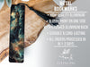 a metal bookmark with a picture of the sky on it