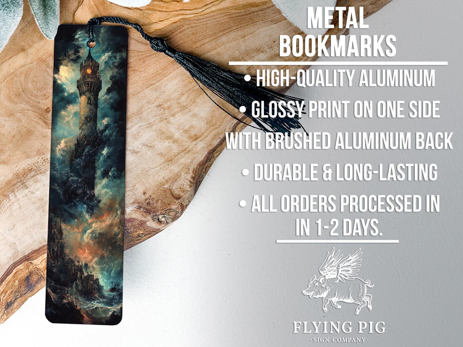 a metal bookmark with a picture of the sky on it