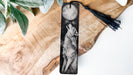 a bookmark with a picture of a wolf on it
