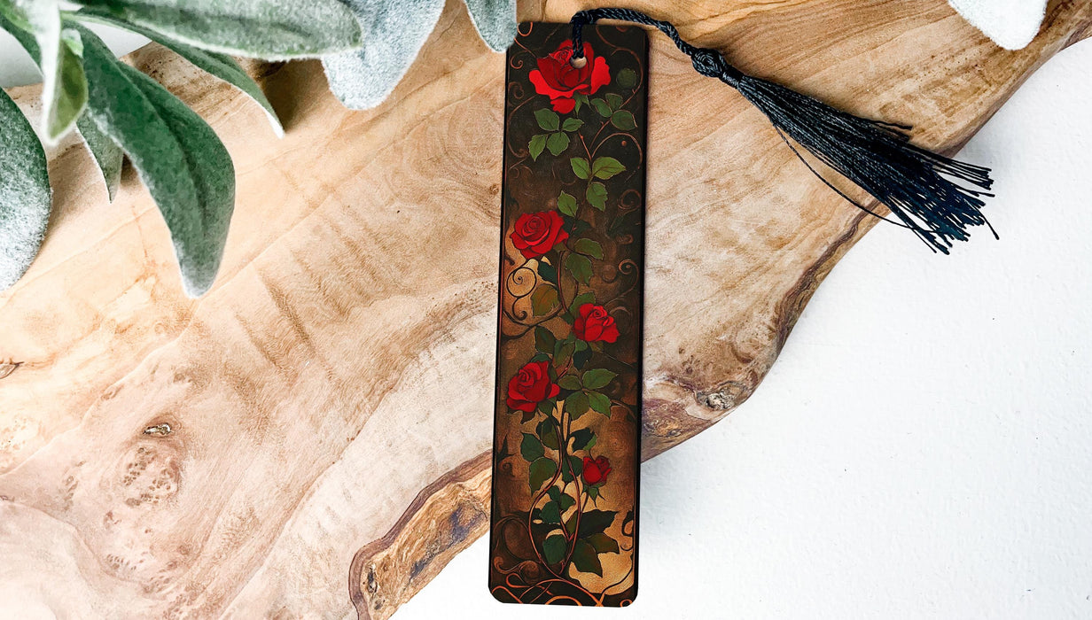 a piece of wood with a painting of roses on it