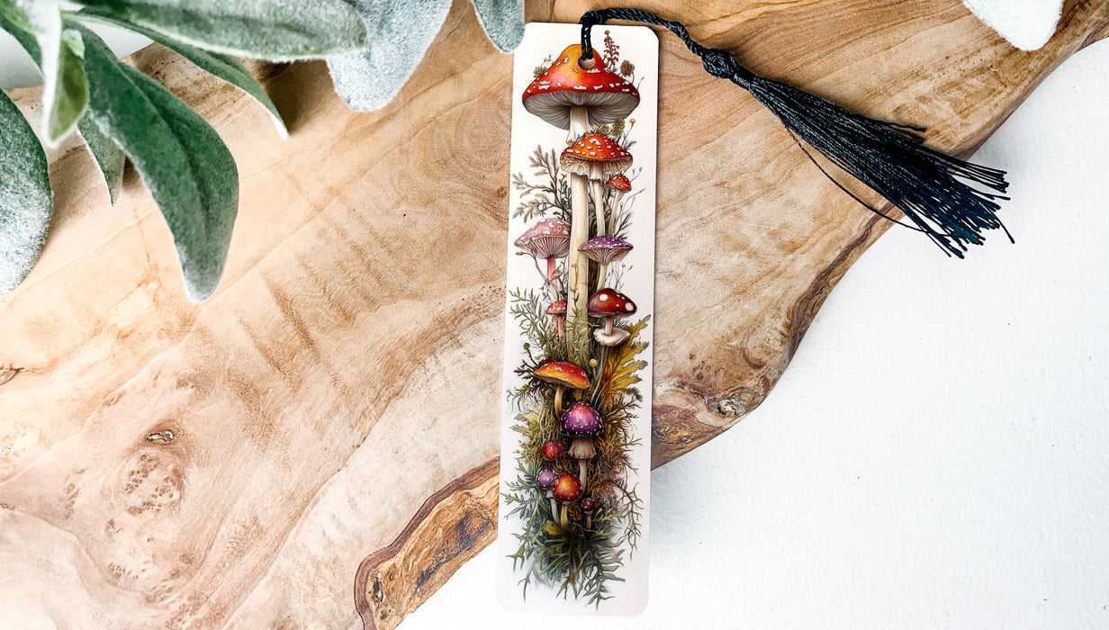 a bookmark with a tassel hanging from it