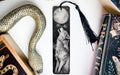 a bookmark with a picture of a wolf on it