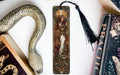 a bookmark with a picture of a woman and a snake on it