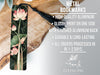 a metal bookmark with pink flowers on it