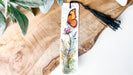 a bookmark with a picture of a butterfly on it