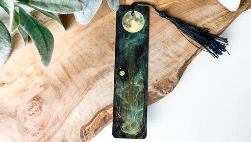 a bookmark with a tassel hanging from it