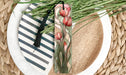 a close up of a plate with flowers on it