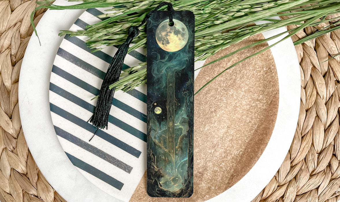 a green bookmark sitting on top of a white plate