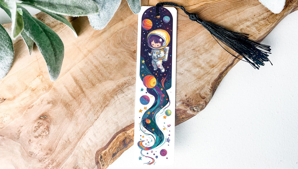 a bookmark with a picture of an astronaut on it
