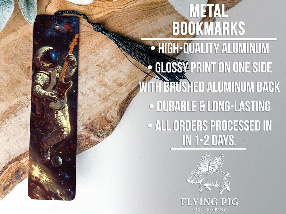 a metal bookmark with a picture of an astronaut on it