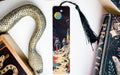 a bookmark with an image of a snake on it