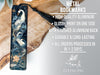 a metal bookmark with a picture of a swan on it