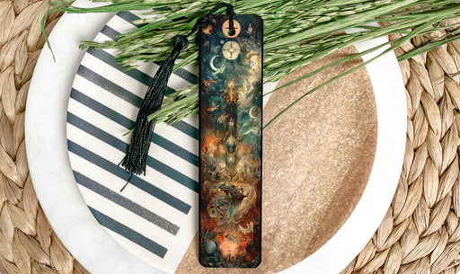 a bookmark on a plate with a plant on it