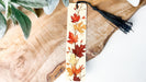 a bookmark with a leaf design on it