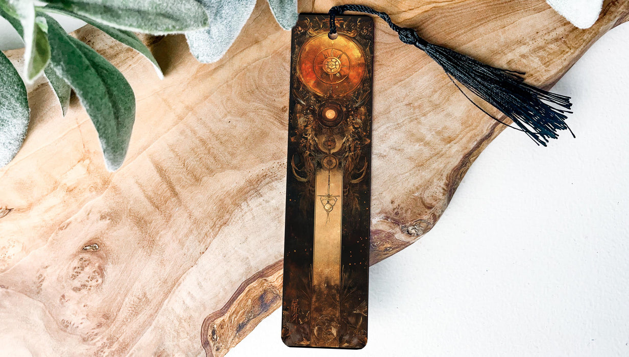 a wooden cross with a tassel hanging from it