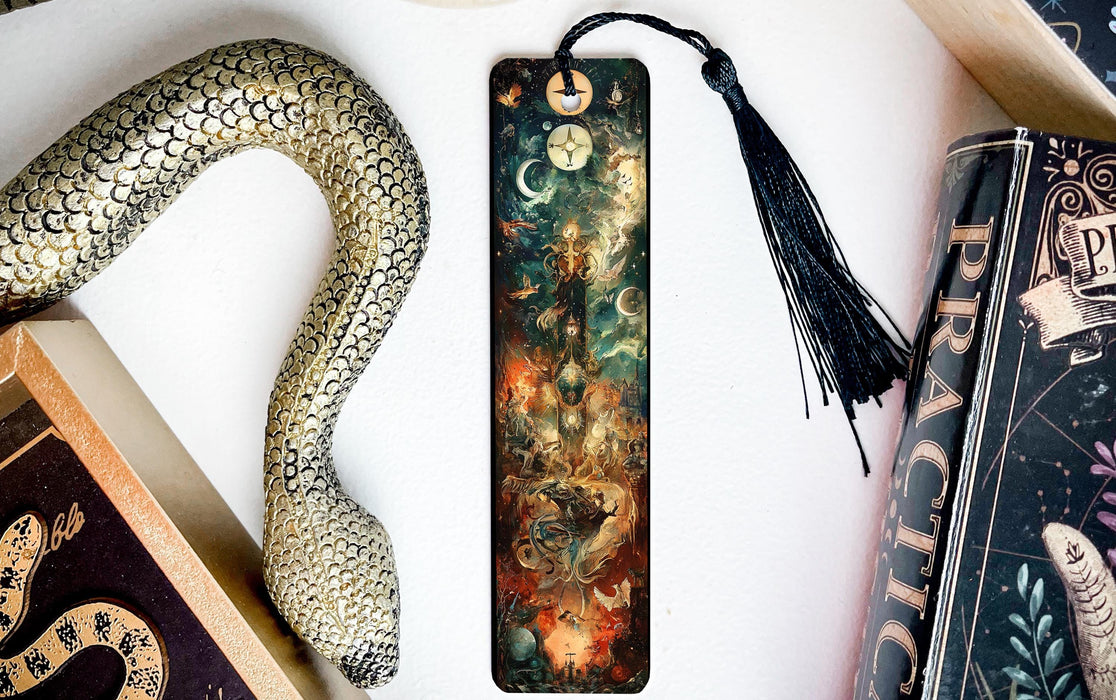 a bookmark with a snake and a book on it