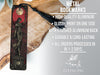 a bookmark with an image of a woman holding a cross