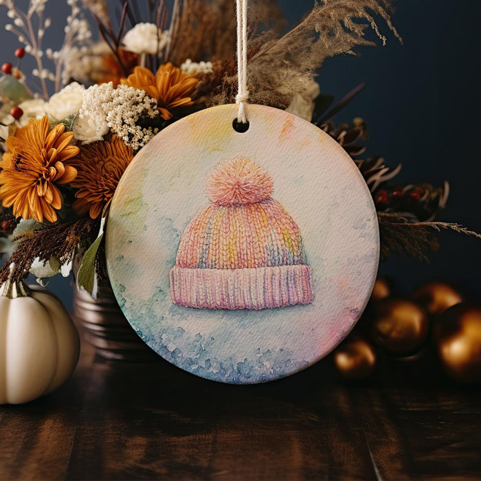 a painted ornament with a hat on it