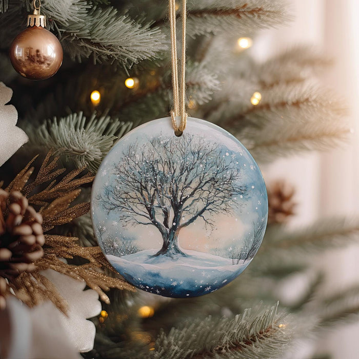 a glass ornament hanging from a christmas tree
