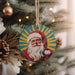 a christmas ornament hanging from a christmas tree