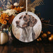 a ceramic ornament with a picture of a dog on it