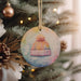 a christmas ornament hanging from a christmas tree