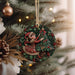 a christmas ornament hanging from a christmas tree