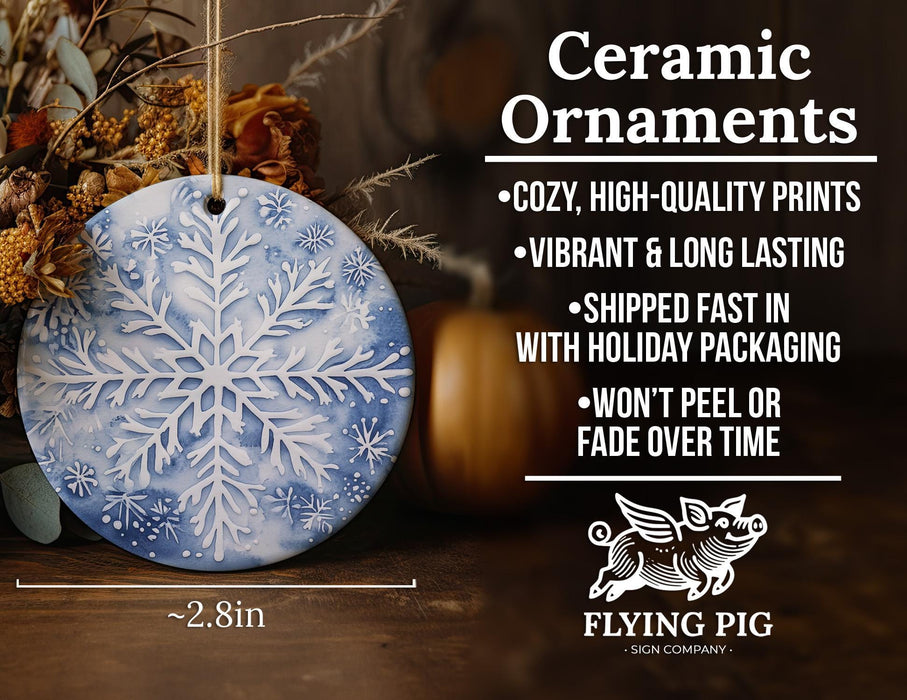 a ceramic ornament with a snowflake design