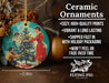 a ceramic ornament with a woman decorating a christmas tree