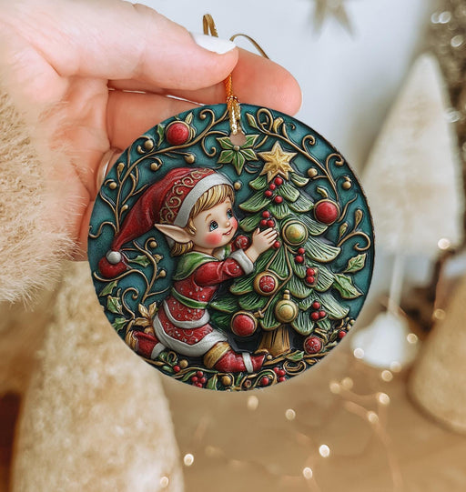 a person holding a christmas ornament in their hand