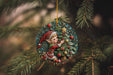 a christmas ornament hanging from a tree