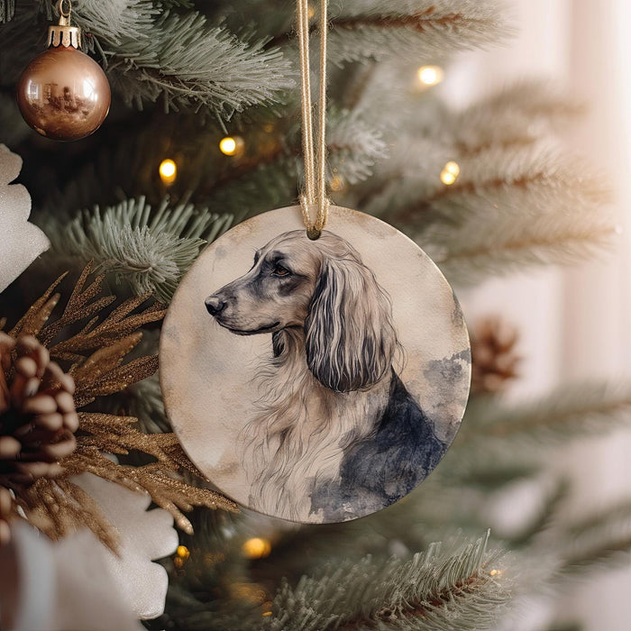 a dog ornament hanging from a christmas tree