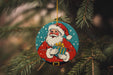 a christmas ornament hanging from a christmas tree