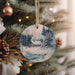 a christmas ornament hanging from a christmas tree