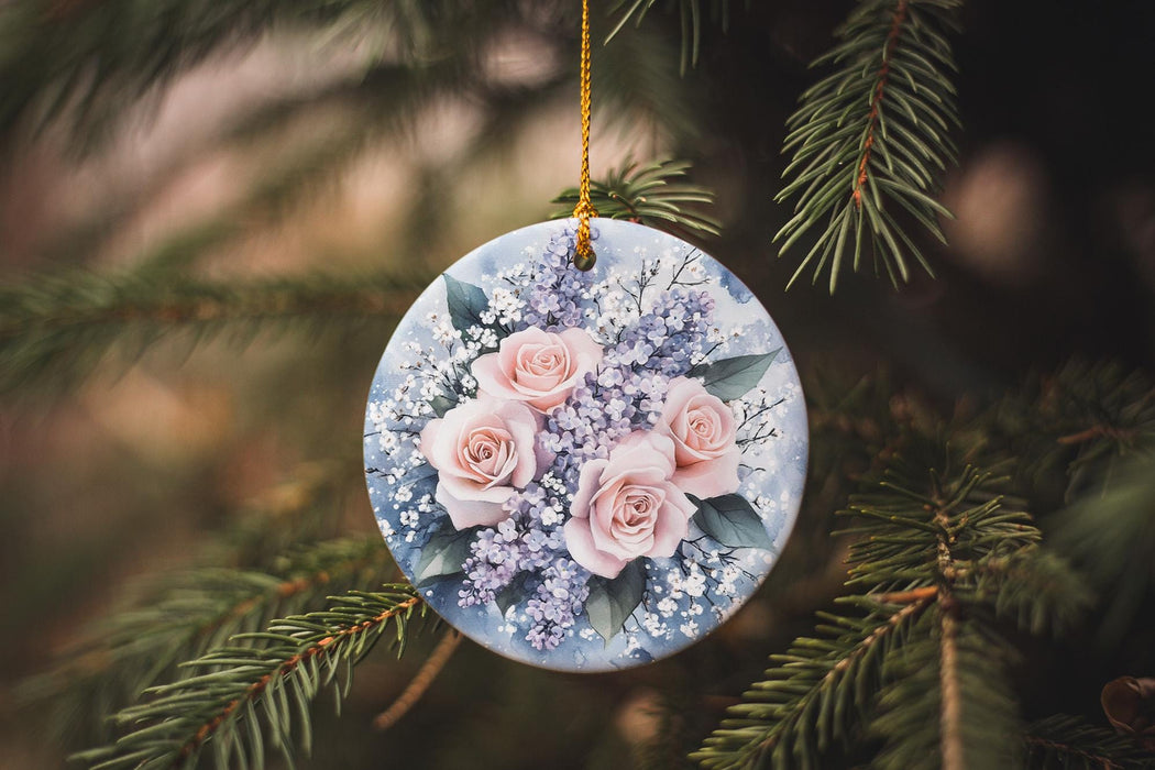 a ceramic ornament with pink roses and baby's breath