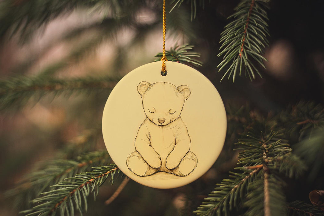 a christmas ornament with a picture of a bear on it